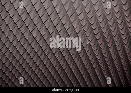 Dark gray diamond-shaped soundproofing. Soundproof coating or slab texture. Abstract geometric texture or background Stock Photo
