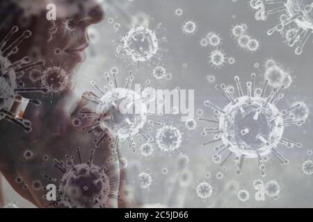 Covid-19 cells against woman praying Stock Photo