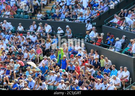 Crowds of spectators on Court 1 at The Championships 2018, Wimbledon All England Lawn Tennis Club, London, UK Stock Photo