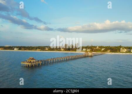 View from the ocean to the pier with tourists. Stock Photo