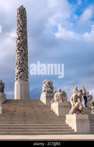 Oslo, Ostlandet / Norway - 2019/08/30: Panoramic view of The Monolith sculpture, Monolitten, in Vigeland Park open air art exhibition - Vigelandsparke Stock Photo