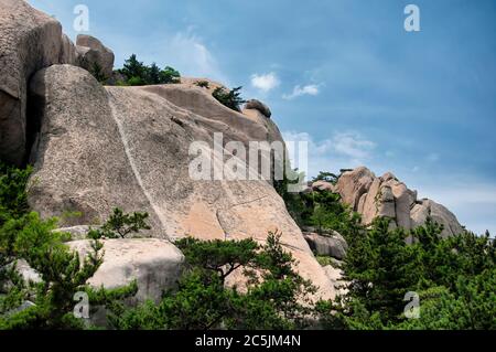 Unusual rock formations on Mount Lao in Qingdao China shandong province sunny day. Stock Photo
