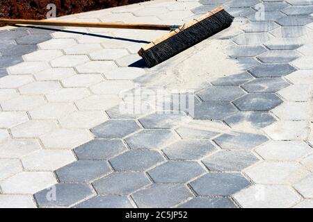 Pavement with two diffent gray hexagon pattern. Cement sidewalk with texture. Background, texture. Stock Photo