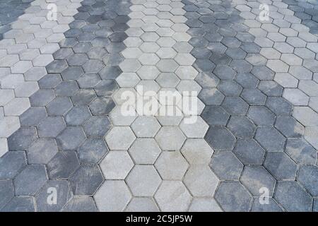 Pavement with two diffent gray hexagon pattern. Cement sidewalk with texture. Background, texture. Stock Photo