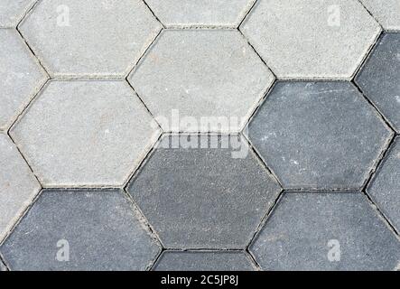Pavement with two diffent gray hexagon pattern. Cement sidewalk with texture. Background, texture. Stock Photo