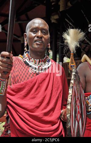 Kenya: Masai men with speer at Diani Reef Resort entrance Stock Photo