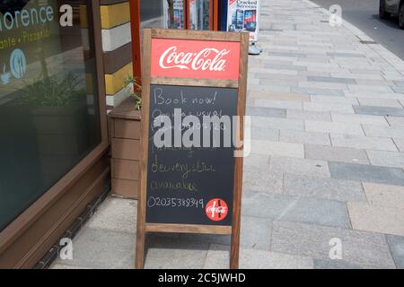 Sidcup, Kent, UK. 03rd July, 2020. Signage outside a restaurant in Sidcup High Street as restaurants prepare to reopen after covid 19 lockdown rules are relaxed by the government. Sidcup, Kent on 3 July 2020. Photo by Alan Stanford. Credit: PRiME Media Images/Alamy Live News Stock Photo