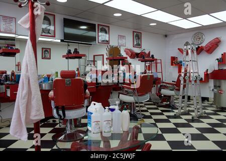 Sidcup, Kent, UK. 03rd July, 2020. Daban Ahmed partner in Red Barber Shop in Sidcup High Street prepares to reopen after covid 19 lockdown rules are relaxed by the government. Sidcup, Kent on 3 July 2020. Photo by Alan Stanford. Credit: PRiME Media Images/Alamy Live News Stock Photo