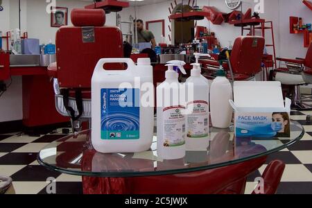 Sidcup, Kent, UK. 03rd July, 2020. Red Barber Shop in Sidcup High Street gets hand gels in preparation to reopen after covid 19 lockdown rules are relaxed by the government. Sidcup, Kent on 3 July 2020. Photo by Alan Stanford. Credit: PRiME Media Images/Alamy Live News Stock Photo