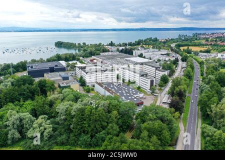 Immenstaad Am Bodensee, Germany. 03rd July, 2020. Airbus Defence and Space is located directly on the shore of Lake Constance. (Aerial view with a drone Credit: Felix Kästle/dpa/Alamy Live News Stock Photo