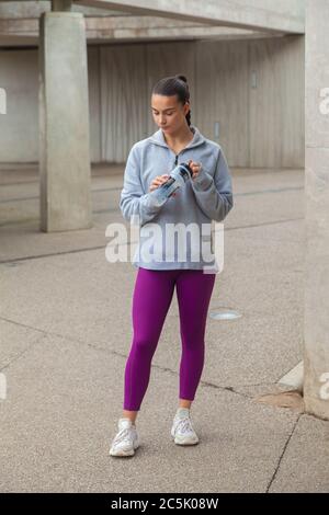 Woman Wearing Purple Leggings Showing Her Amazing Result Stock Photo -  Download Image Now - iStock