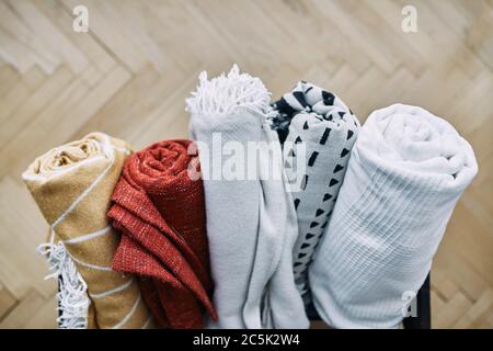 several folded colorful blankets Stock Photo