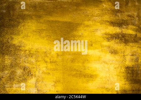 Gold background with scuffs. Golden Background and texture. Shiny gold and yellow background, Stock Photo