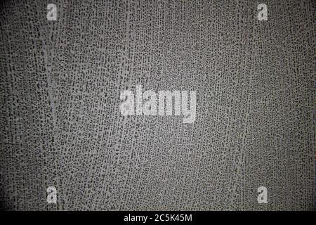 A black background with white texture on it.  A nice black background with a chalk texture on it Stock Photo