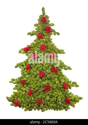 Christmass spruce made from pumpkin seeds isolated on white. Clipping Path included. Stock Photo