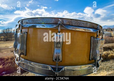 Close up photo of an antique snare drum on a beach with the sun Stock ...