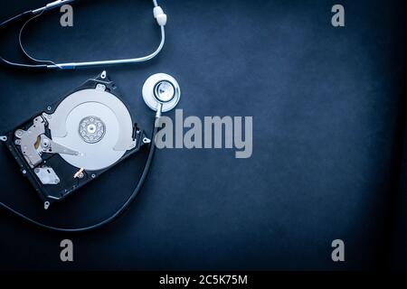 computer hard drive disk repair process with copy space Stock Photo