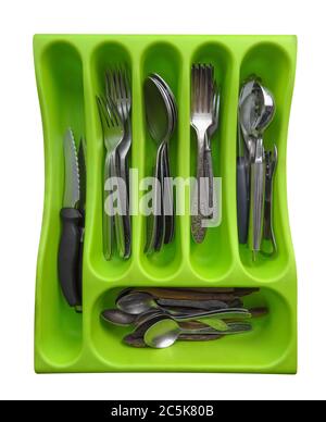 Plastic tray with forks, spoons and knives for the kitchen drawer. It is isolated on white and have Clipping Path. Stock Photo
