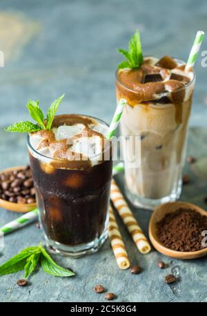 Delicious black and latte iced coffee in the glass Stock Photo
