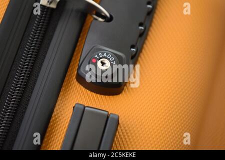 Combination lock for zipper on a suitcase Stock Photo - Alamy