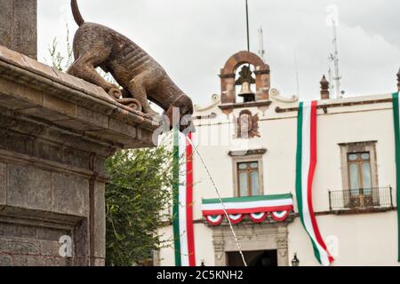 Fuente de los Perritos or Puppy Fountain outside the government palace or Palacio de Gobierno along the Plaza de Armas in the old colonial section of Santiago de Queretaro, Queretaro State, Mexico. Stock Photo