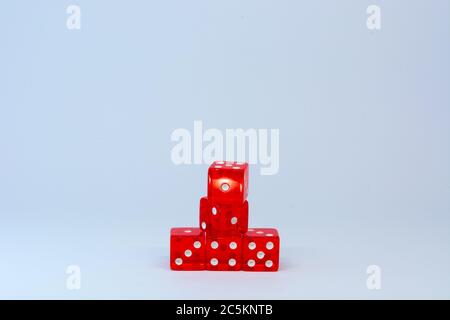 red glass dices on the white background Stock Photo