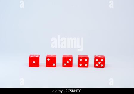 red glass dices on the white background Stock Photo