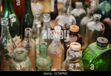 Antique glass bottles for sale at a flea market, brimfield, massachusetts Stock Photo