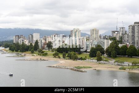 A view over the beaches at Sunset Beach Park ,  English Bay and the apartment and condominium buildings in the West End district in Vancouver, British Stock Photo