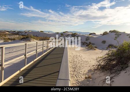 Hiking In The Desert. Boardwalk hiking trail through the White Sands National Monument in New Mexico Stock Photo