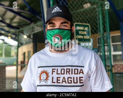 June 29, 2020: League intern wears a mask during Florida Collegiate Summer League game action between the Sanford Mavericks and the Sanford River Rats at Historical Sanford Stadium in Sanford, FL Romeo T Guzman/Cal Sport Media Stock Photo
