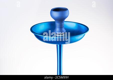 Upper part of a hookah, a bowl for tobacco of blue color, isolated on a white background. Modern blue hookah. Stock Photo
