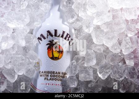 POZNAN, POL - MAY 28, 2020: Bottle of Malibu Rum, a flavored rum-based liqueur made with natural coconut extract, produced by West Indies Rum Distille Stock Photo