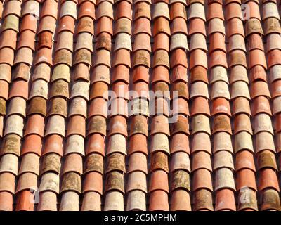 traditional clay red french roofing tiles used in roof construction in ...