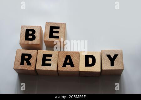 Be ready words in letters on wooden cubes. Prepared to unpredictable situation business concept, healthcare awareness concept Stock Photo
