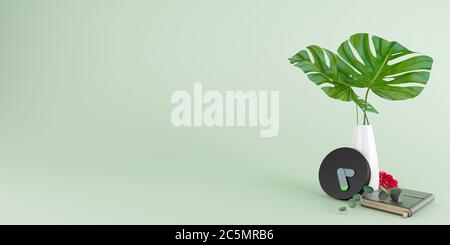 Black alarm clock and vases with leaves and note book and red flower on lighting green background, time concept, minimal composition, Stylish abstract Stock Photo