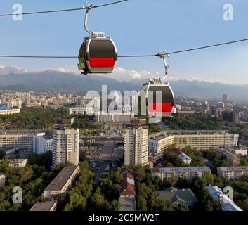 Two cabins of the funicular over the Almaty city, Kazakhstan Stock Photo