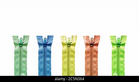 Set of zippers for clothes in different colors. Isolated on white background Stock Photo