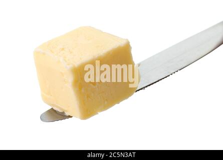 butter cube on knife isolated on white background Stock Photo