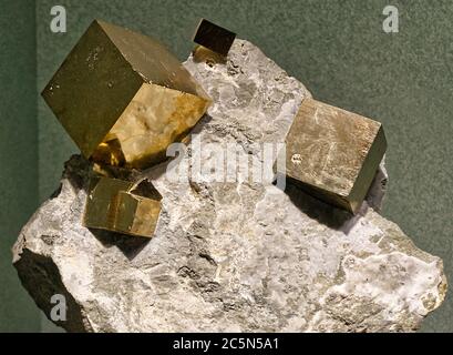 Pyrite cubic crystals embedded in a matrix Stock Photo
