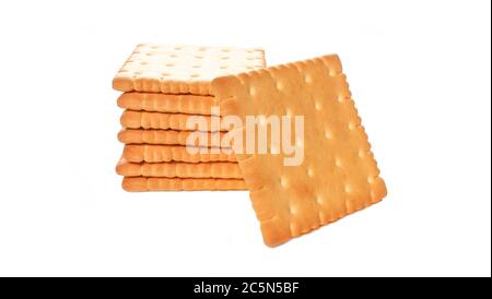 Multiple butter tea cookies isolated on white background. Stack of French biscuits Stock Photo