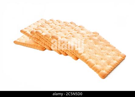 Multiple butter tea cookies isolated on white background. Stack of French biscuits Stock Photo