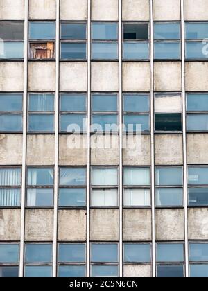 Detail with very old office building from communist era. Worn out office building. Stock Photo