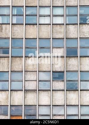 Detail with very old office building from communist era. Worn out office building. Stock Photo