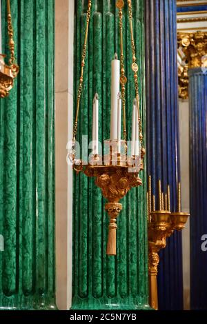 Saint Petersburg, Russia - Jan 30, 2020: Decoration details in the interior of the Saint Isaac Cathedral in St Petersburg. Golden lamp and malachite c Stock Photo