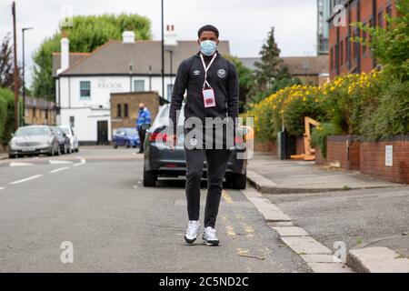 London, UK. 4th July, 2020. Brentford’s #23 Julian Jeanvier arrives at Griffin Park ahead of Brentford FC vs Wigan Athletic. Brentford go into the game five points behind West Brom and are looking to get into the automatic promotion spot. Credit: Liam Asman/Alamy Live News Stock Photo