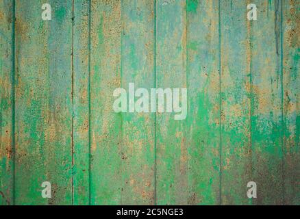 Green ragged texture on the background. Metallic green yellow old texture Stock Photo