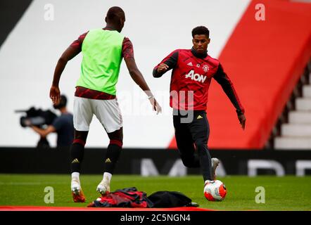 Manchester United's Marcus Rashford warms up prior to the Premier League match at Old Trafford, Manchester. Stock Photo