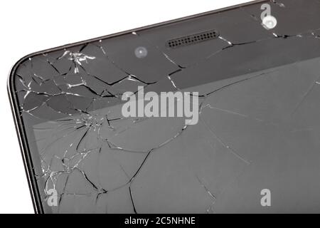Broken glass of smartphone screen close-up of cracks. Stock Photo