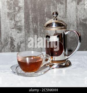 Cups and saucer, tea set on silver background Stock Photo